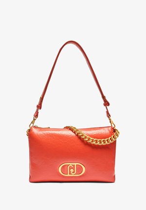 Red leather shoulder bag with a gold chain accent. Features a textured finish and a logo emblem on the front. Adjustable strap included.