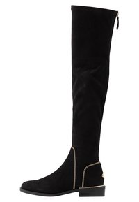 Sorte ruskind over knæ-støvler med rund tå, guld lynlåsdetalje og kontrastsying langs siden, flad hældesign.