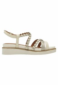 Beige Damen-Sandalen mit einem schweren Mittelsohle, die über ineinander verwobene Riemen, strukturierte Akzente und eine glatte Oberfläche verfügen. Verstellbarer Knöchelriemen enthalten.