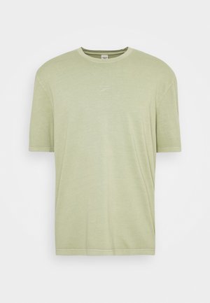 T-shirt Reebok vert clair à manches courtes, col rond, avec un petit logo de la marque brodé au centre de la poitrine.