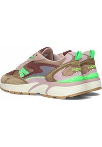 Brown and pink sneakers with mesh, suede, and rubber materials. Features neon green accents and a textured sole. Chunky design with moderate heel.