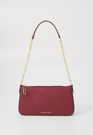 Burgundy synthetic handbag with a gold chain strap, rectangular shape, top zipper, and embossed logo on the front.
