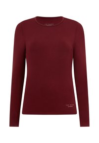 Tricou burgund cu mânecă lungă, cu decolteu rotund, realizat dintr-un material neted, având un accent discret cu logo aproape de tiv.