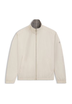 Light beige jacket with a stand collar, front zipper, two side pockets, and elastic cuffs. Interior features a checkered pattern.