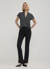 Calliope FLARE  - Pantaloni - nero