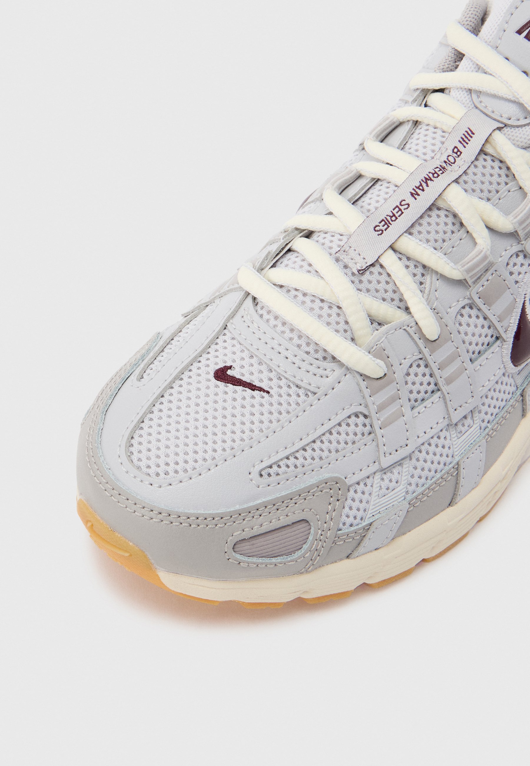 grey and burgundy nikes