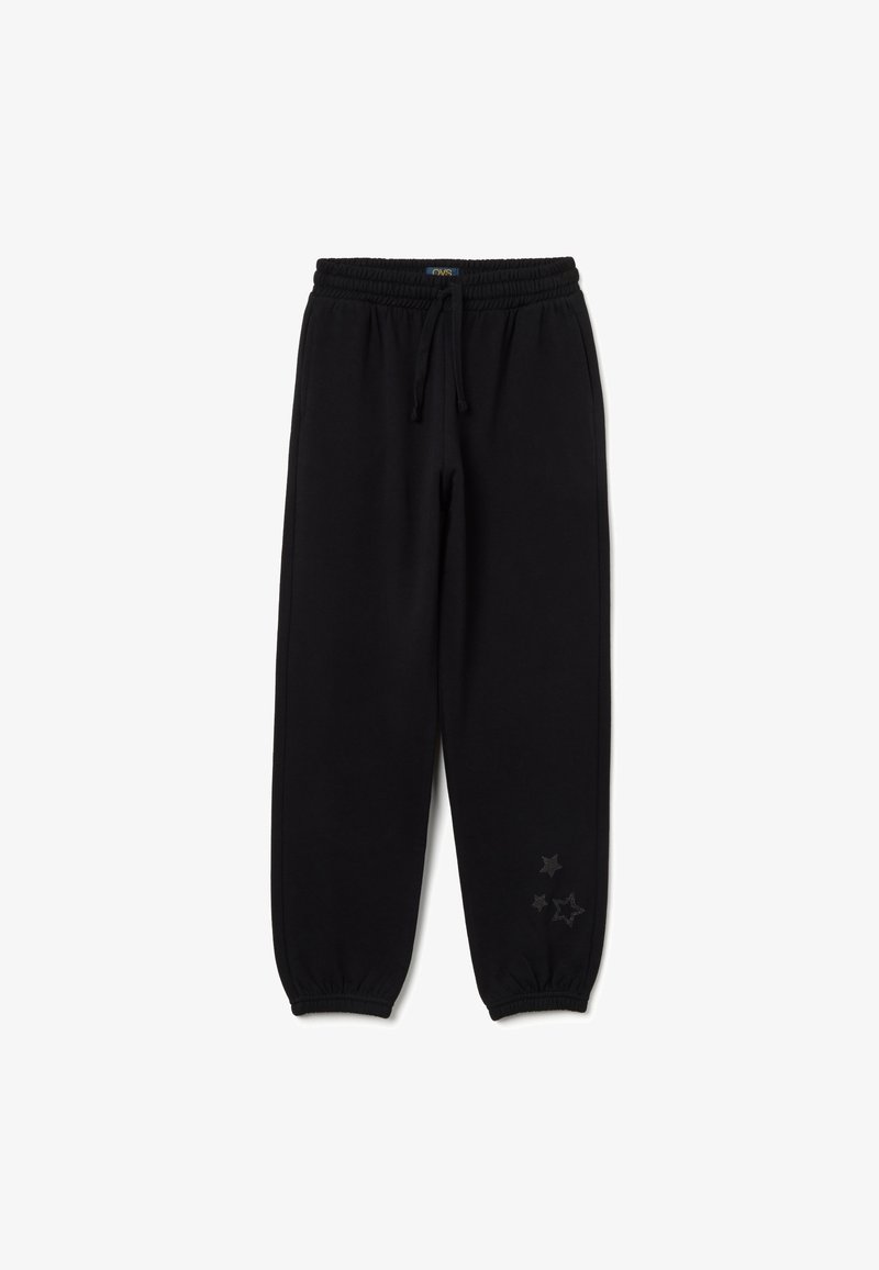 Pantalones deportivos negros con cintura elástica y cordón ajustable. Presentan gráficos de estrellas en la pierna izquierda. Hechos de tela suave.