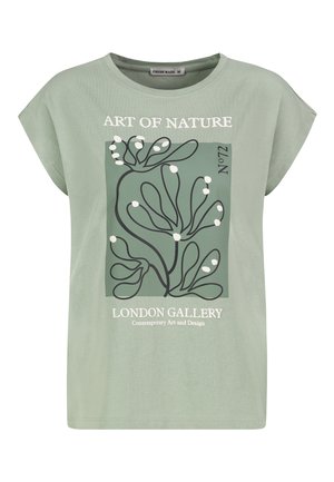 Green cotton t-shirt with a loose fit, featuring a graphic design of abstract plants, and text "ART OF NATURE" and "LONDON GALLERY."