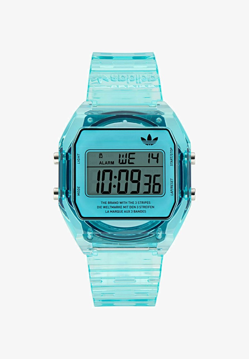 Digitalna ura na zapestju s prosojnim turkiznim paščkom prikazuje čas, datum in nastavitve alarma, na vrhu pa je logotip Adidas.