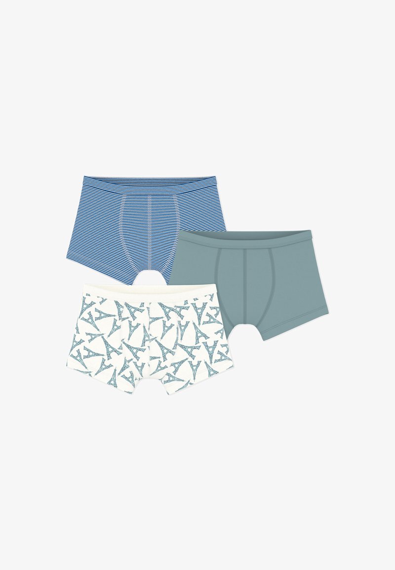Trois paires de boxers : une rayée bleue, une unie vert sarcelle, et une blanche avec un motif répétitif de la Tour Eiffel.