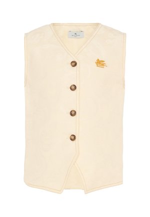 Chaleco sin mangas crema con escote en V, cuatro botones marrones, patrón sutil y pequeño emblema dorado de pájaro en el pecho izquierdo.