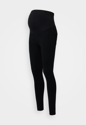 Leggings da maternità neri con vita alta per supporto, design aderente e tessuto morbido ed elasticizzato per il comfort.