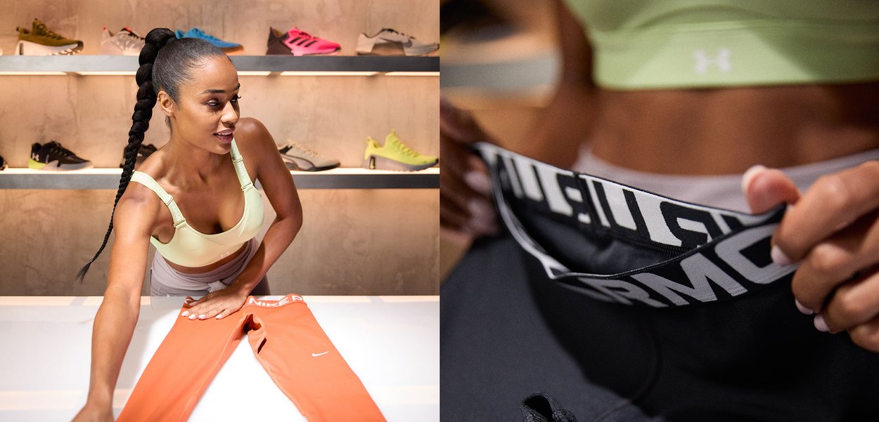 Orange Nike leggings with white logo, displayed on a table. Green athletic bra and black waistband with logo visible in the image. Background shoes.
