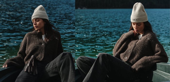 Cardigan scurt, pufos și maro, cu butoane mari, asortat cu blugi denim închiși și o căciulă bej cu model raiat, pe un fundal cu apă albastră.