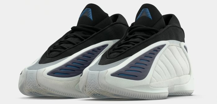 Chaussures de sport noir et blanc avec une tige texturée, des accents bleus et une semelle extérieure épaisse dotée d'un dessin de bande de roulement à motifs.