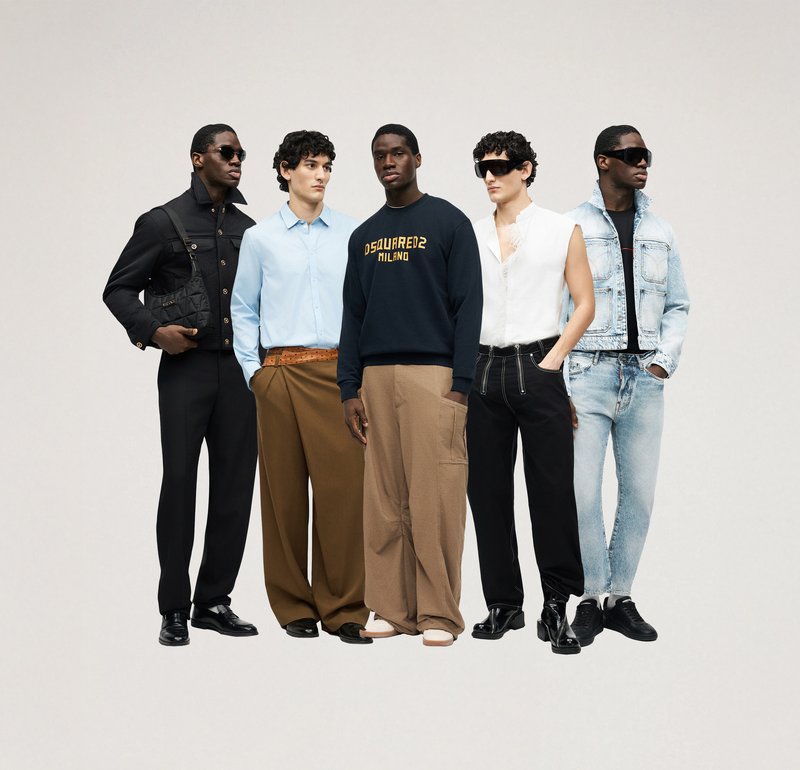 Fem män står på rad klädda i olika samtida kläder, inklusive denim, vida byxor, en ljusblå skjorta och solglasögon.