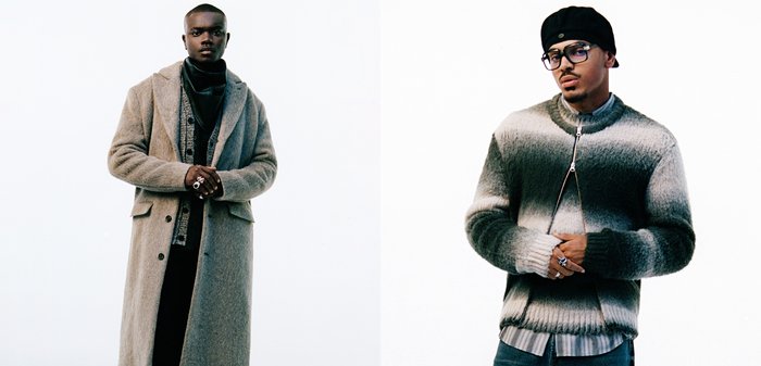 Zwei Models stehen vor einem weissen Hintergrund. Links ein langer, hellgrauer Wollmantel, kombiniert mit einem dunklen Schal. Rechts ein Pullover mit Reissverschluss und einem Verlaufsdesign in Grau und Weiss.