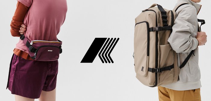 Person trägt eine kastanienbraune Bauchtasche, eine andere mit einem großen beigen Rucksack mit schwarzen Trägern, beide mit dem Rücken zur Kamera.