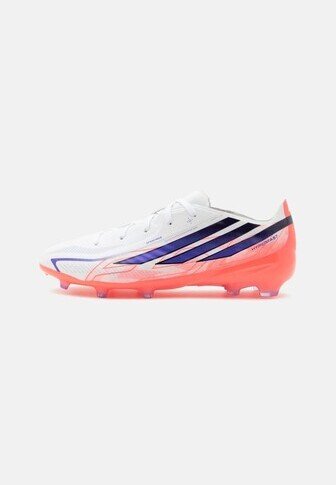 White and coral football cleat with purple stripes on the sides and molded studs on the sole for traction on grass.