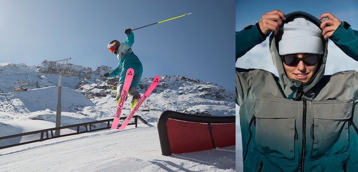 Skigear inkluderer knallrosa Fischer-ski og en jakke i grått til blågrønt med lommer, kombinert med solbriller og en lett beanie.