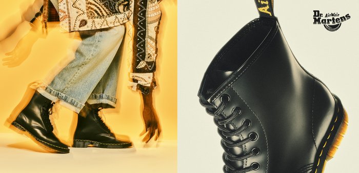 Bottes basses en cuir noir avec surpiqûres jaunes, bout rond et fermeture à lacets. Dotées d'une languette de talon jaune emblématique pour faciliter l'enfilage.