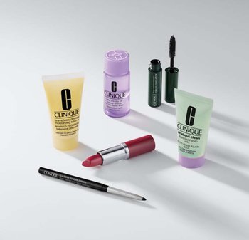 Clinique skincare products including yellow lotion, purple cleansing oil, green face wash, black mascara, and red lipstick in various containers.