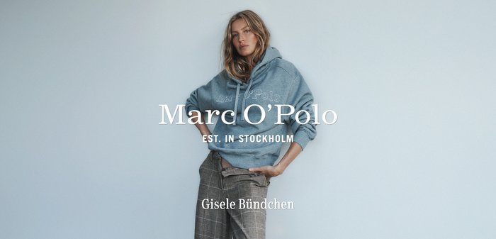 Szara bluza z kapturem i sznurkiem do regulacji, z logo "Marc O'Polo". W połączeniu z wzorzystymi spodniami, charakteryzującymi się luźnym krojem i miękkimi fakturami.