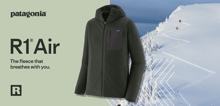 Dunkelgrüne Fleecejacke mit strukturiertem Muster, durchgehendem Reißverschluss und Kapuze. Mit einer grauen Brusttasche und atmungsaktivem Design, ideal für Outdoor-Aktivitäten.