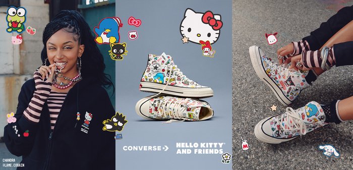 Zapatillas Converse de caña alta con estampados de personajes de dibujos animados de Hello Kitty y Amigos sobre un fondo gris, rodeadas de pegatinas de personajes.