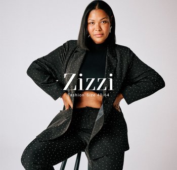 Svart kavaj med vita prickar, bärs över en svart topp, matchas med byxor i samma stil. Slät tyg och avslappnad passform.