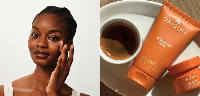 Petite tasse à espresso et soucoupe à côté de la crème hydratante orange Origins GinZing SPF 30 et de la crème éclaircissante pour les yeux sur une surface en bois.