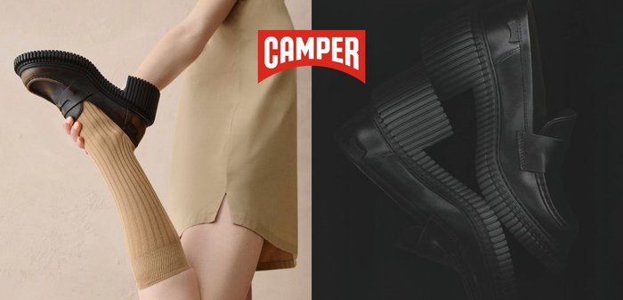 Chaussures en cuir noir avec une semelle épaisse et striée et une sangle sur le dessus. Présentent une finition lisse et un design à bout arrondi.