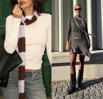 Vrouw brengt lippenstift aan terwijl ze een witte top, een gestreepte sjaal, spijkerbroek draagt en een zwarte tas vasthoudt; een andere vrouw poseert in een zwart gestreepte jurk, laarzen en zonnebril.