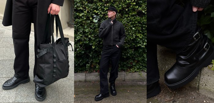 Sac fourre-tout en nylon noir avec bretelles ajustables, associé à un pantalon noir et des chaussures à semelles épaisses et texture lisse. Pull en maille gris foncé.
