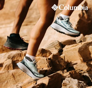 Columbia Trailrunning-Schuhe in Hellblau und Schwarz, mit einem atmungsaktiven Mesh-Obermaterial, strukturiertem Sohlenprofil und hervorgehobenem Schnürsystem.