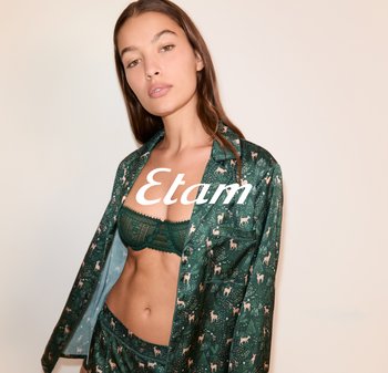 Grünes Satin-Pyjama-Set mit einem Muster aus Rehen und Pflanzen; enthält einen passenden Spitzen-BH, der mit filigranen Details und einer lockeren Passform begeistert.