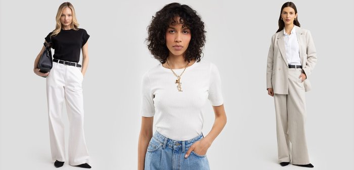 Drie vrouwen in verschillende outfits: een zwart T-shirt met witte wijde broek, een witte geribbelde top met blauwe spijkerbroek, en een beige pak.