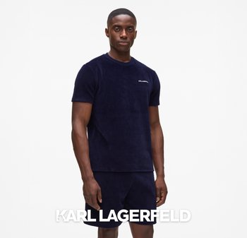 Navy blue cotton terry crewneck t-shirt with short sleeves and matching shorts, featuring a subtle logo on the chest. Smooth texture.