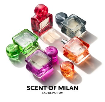 Colorful perfume bottles with rounded shapes in red, green, purple, orange, and gray. Clear glass with text labels, varying sizes, and designs.