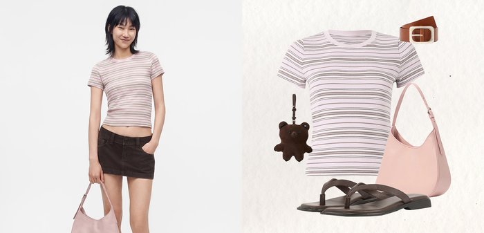 Jeune femme portant un t-shirt rayé et une jupe noire, tenant un sac rose ; tenue avec t-shirt assorti, ceinture, sandales, porte-clés ours et sac rose.