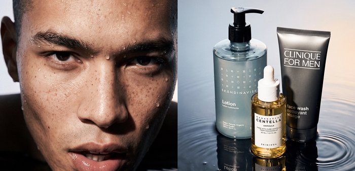 Gros plan d’un homme au visage humide à côté de trois produits de soins de la peau : lotion, ampoule Centella et nettoyant visage Clinique for Men sur une surface réfléchissante.