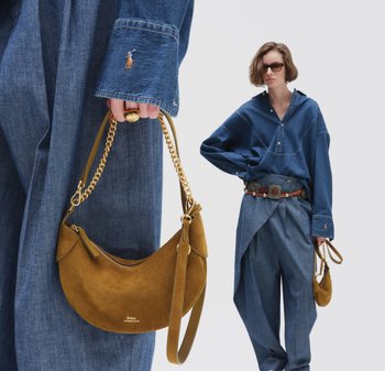 Mujer con un conjunto de mezclilla de gran tamaño sosteniendo un bolso de ante marrón con cadena dorada y llevando gafas de sol oscuras y un cinturón ancho.