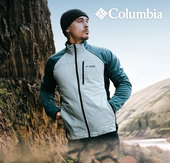 Veste Columbia pour hommes en bleu clair et en sarcelle avec un zip à l'avant, un col montant, des manches longues et un petit logo sur la poitrine.