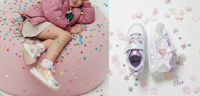 Niño con chaqueta rosa y zapatillas plateado-rosadas acostado sobre un gran puf rosa cubierto de confeti colorido.