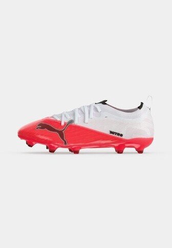 Red and white Puma Nitro soccer cleat with black Puma logo and studs on the sole, designed for firm ground play.