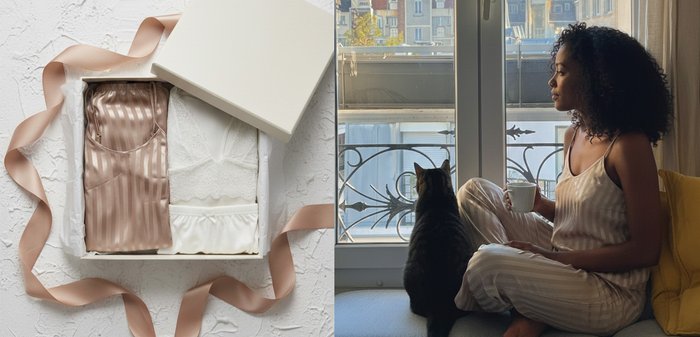 Une personne assise porte des vêtements d'intérieur légers à rayures claires, tenant une tasse. Un chat tigré est assis à côté d'elle, regardant par une grande fenêtre.