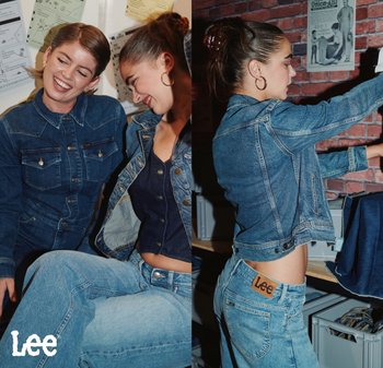 Chaqueta de mezclilla y jeans en azul medio; textura desgastada y corte clásico. Etiqueta de marca notable en la cinturilla; detalles de botones en la chaqueta.