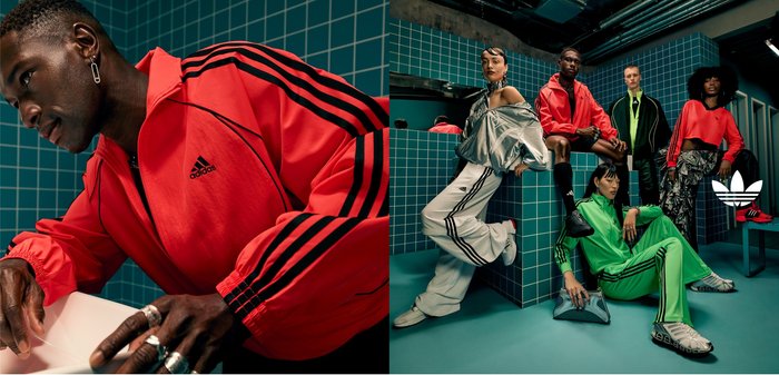 Abbigliamento sportivo rosso e verde, con strisce nere, dotato di texture lucide e variazioni di stili. Gruppo in pose in un ambiente piastrellato.
