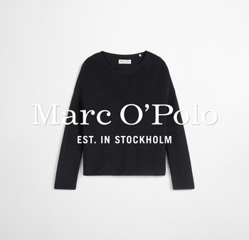 Granatowy sweter prążkowany z okrągłym dekoltem i długimi rękawami, o luźnym kroju. Metka informuje "Marc O'Polo, założona w Sztokholmie."