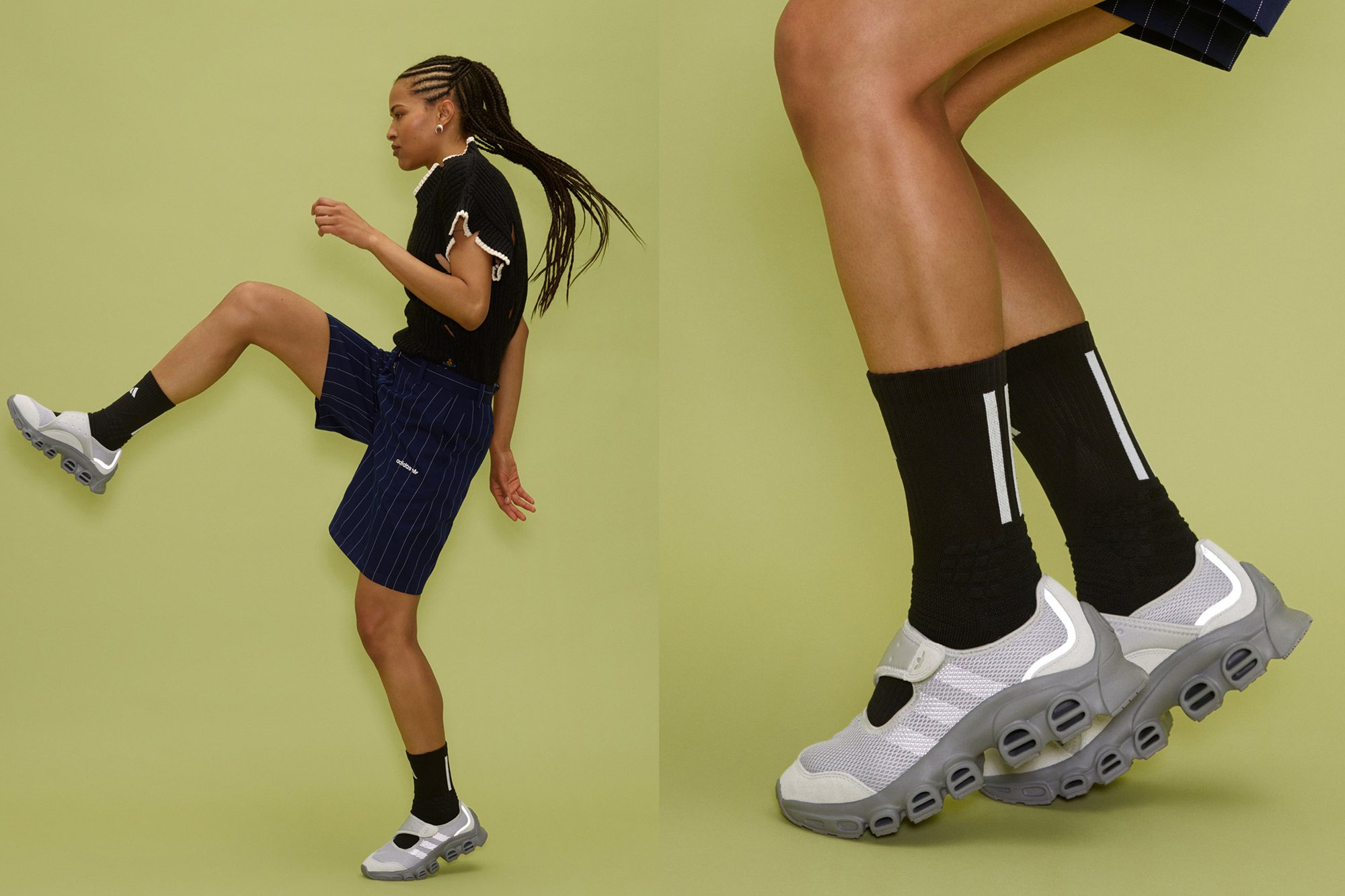 Zapatillas deportivas en gris y blanco con una parte superior de malla y suela acolchada. Calcetines a rayas negras complementan los pantalones cortos azul marino a rayas.